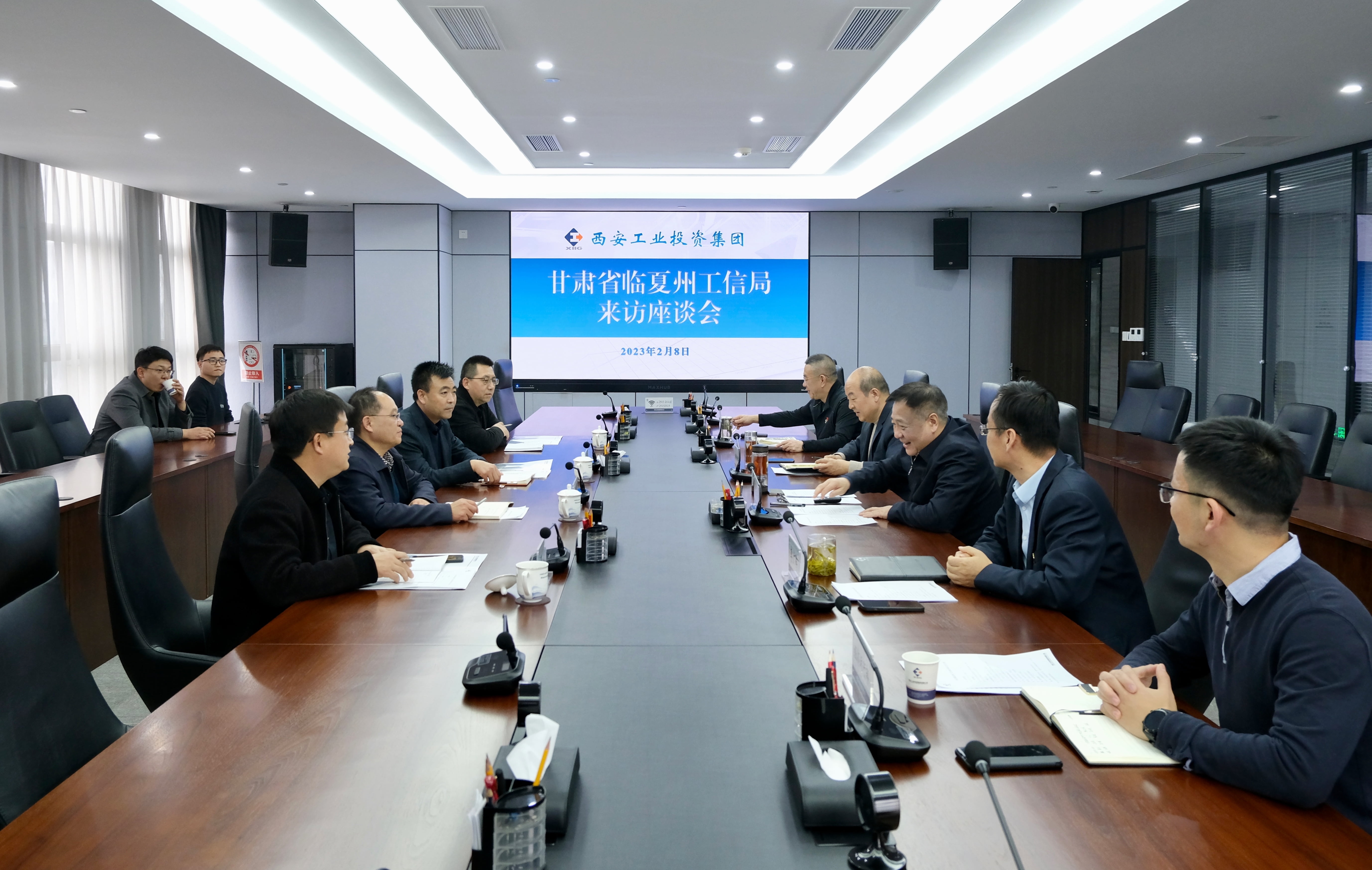 甘肃省临夏州工信局到MG不朽情缘集团进行工作互换