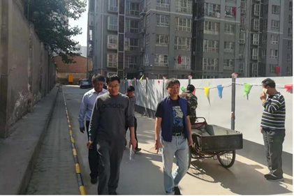 集团国庆期间积极发展光华食品厂幼区环境卫生整治工作